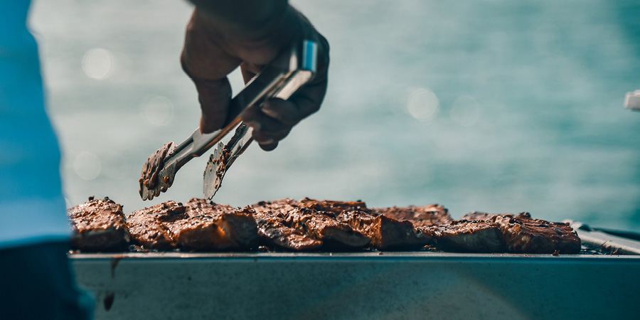 Enjoying a Portuguese barbecue onboard our ship